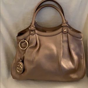 Gucci rose gold metallic leather satchel